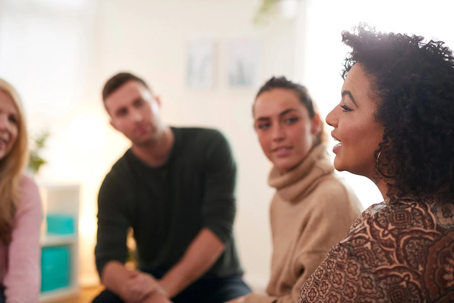 People participate in addiction support groups.